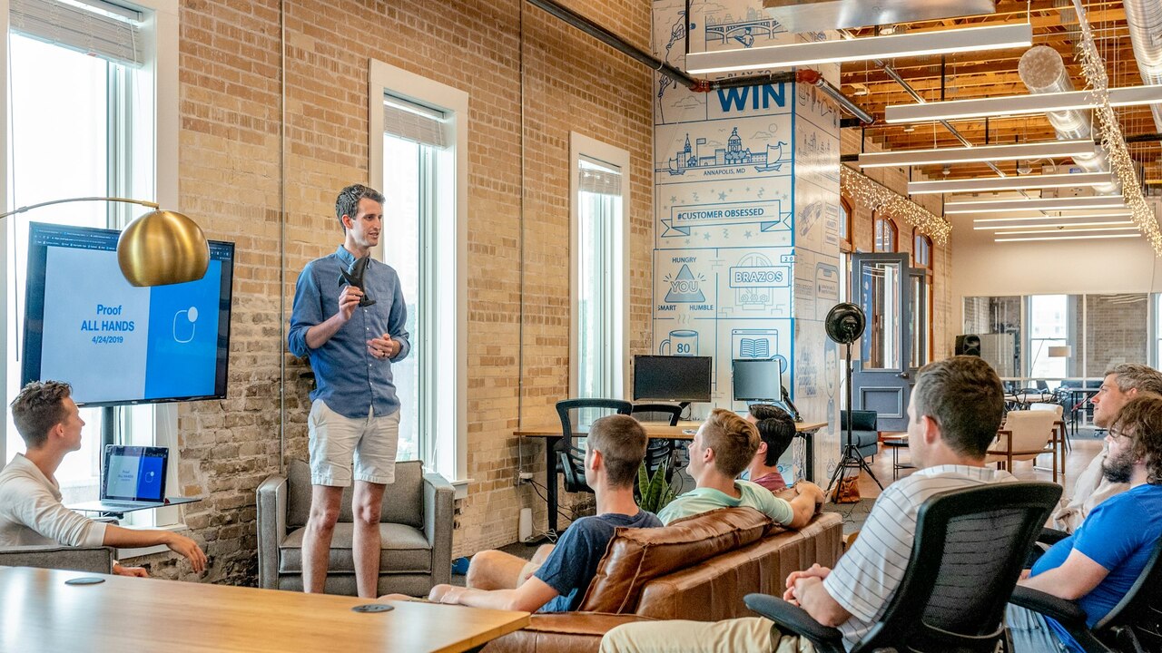 Business professionals meeting around a conference table in a boardroom