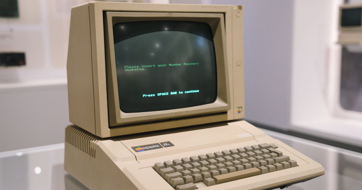 An old beige desktop computer waiting at a prompt that says press space bar to continue